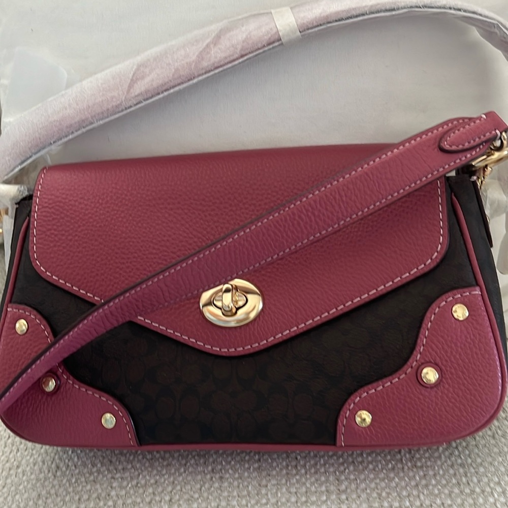 NWT • Coach signature crossbody bag
Brown & pink coated  pebbled leather canvas